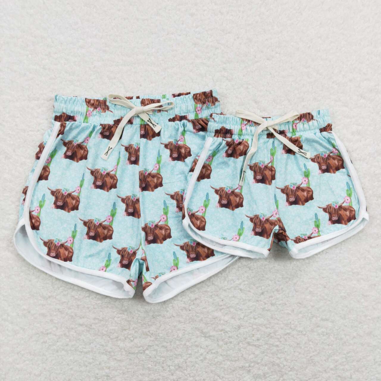 SS0123 Highland cow flowers blue kids shorts