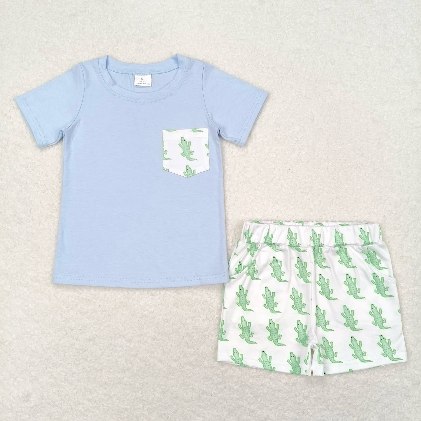 green crocodile RTS sibling clothes