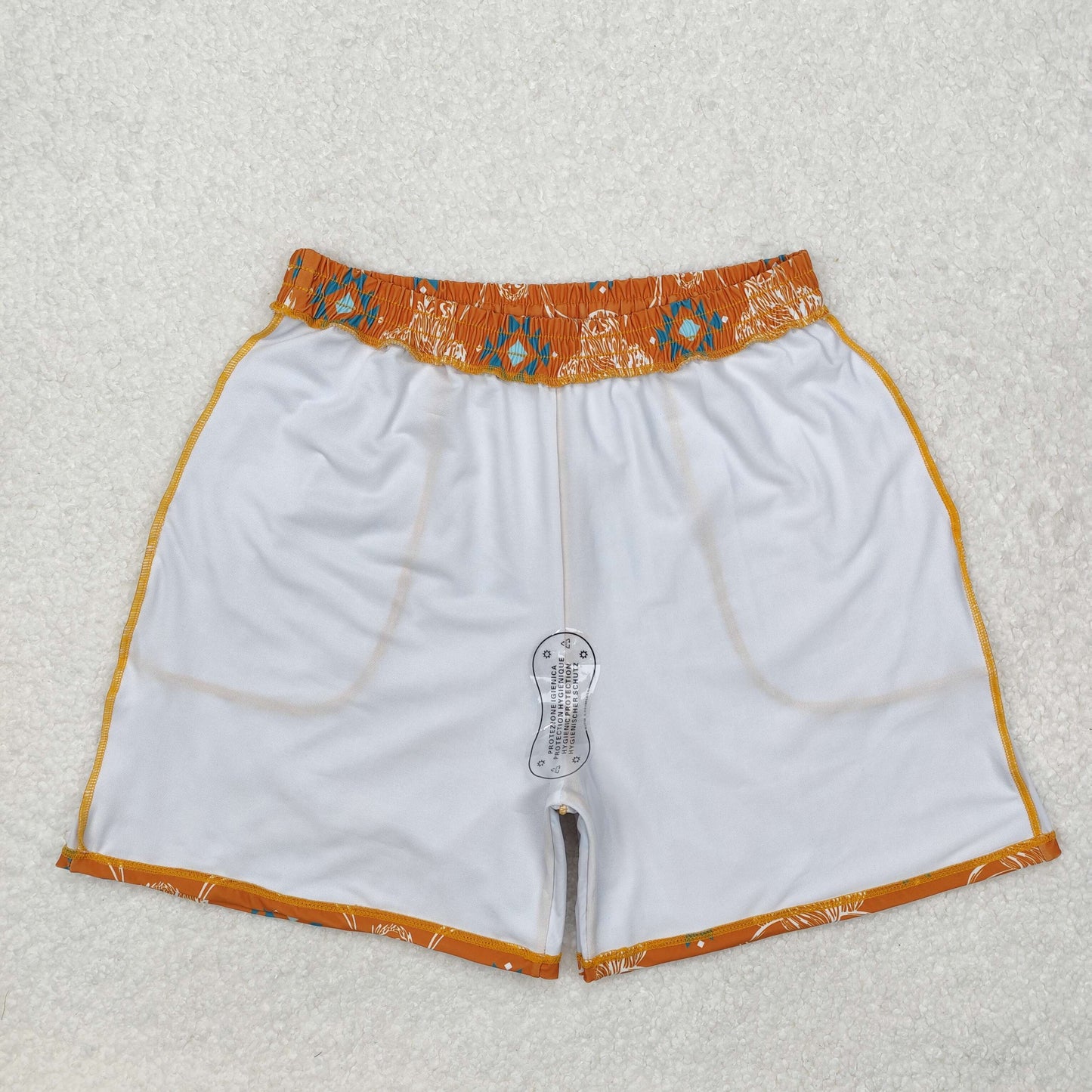 S0462 Western highland cow Aztec brown adult man swimming trunk